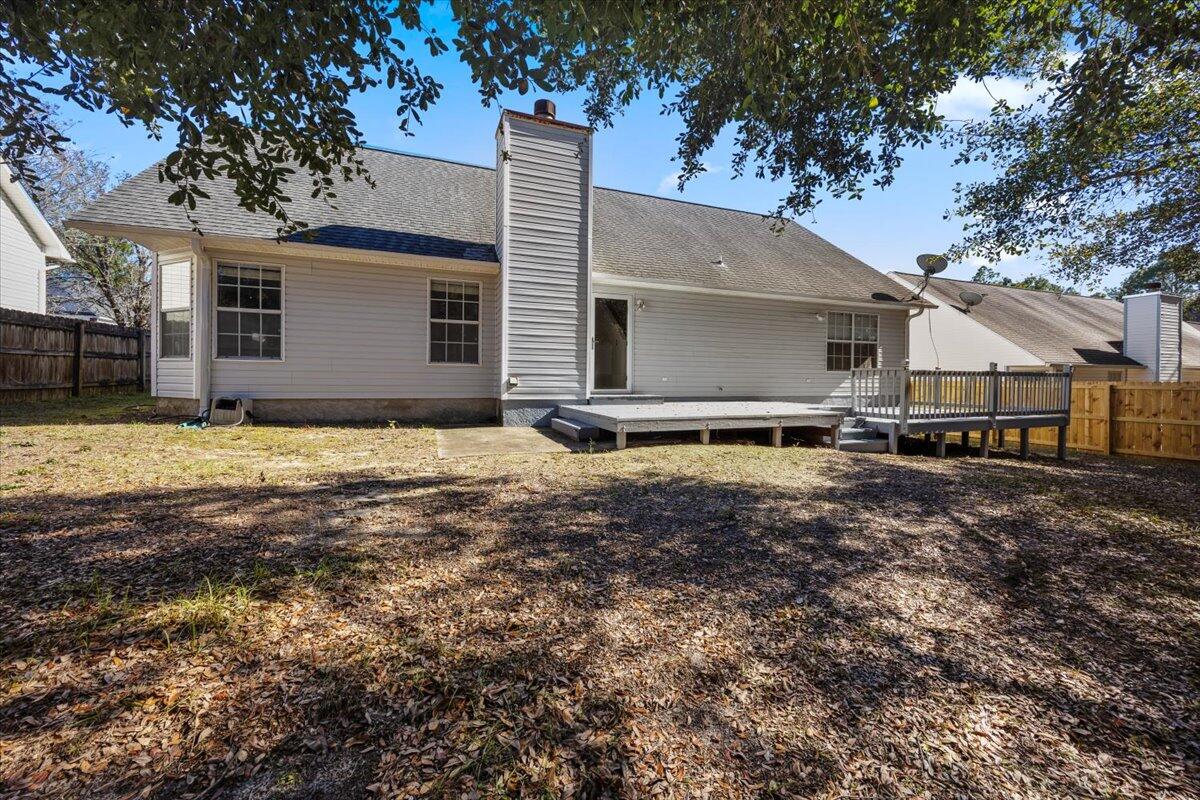439 Northview Lane Crestview, FL 32536 - Photo 26 of 32 a view of a house with backyard and sitting area