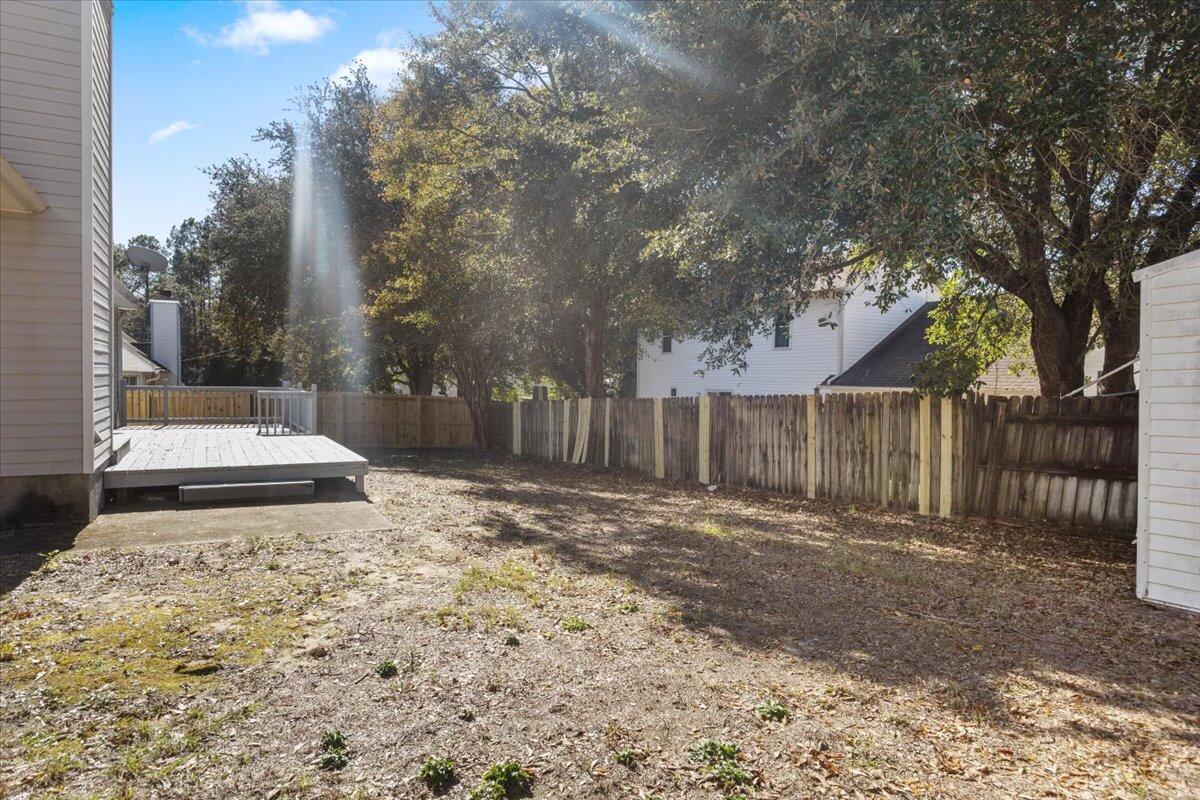 439 Northview Lane Crestview, FL 32536 - Photo 28 of 32 a view of a backyard with wooden fence