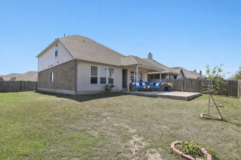 a house view with a garden space