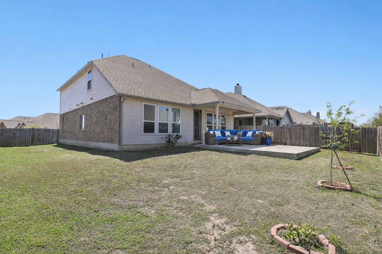 3816 Bow Perch Street Pflugerville, TX 78660 - Photo 17 of 23 a house view with a garden space
