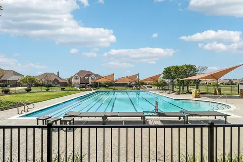 a view of a yard with an umbrella