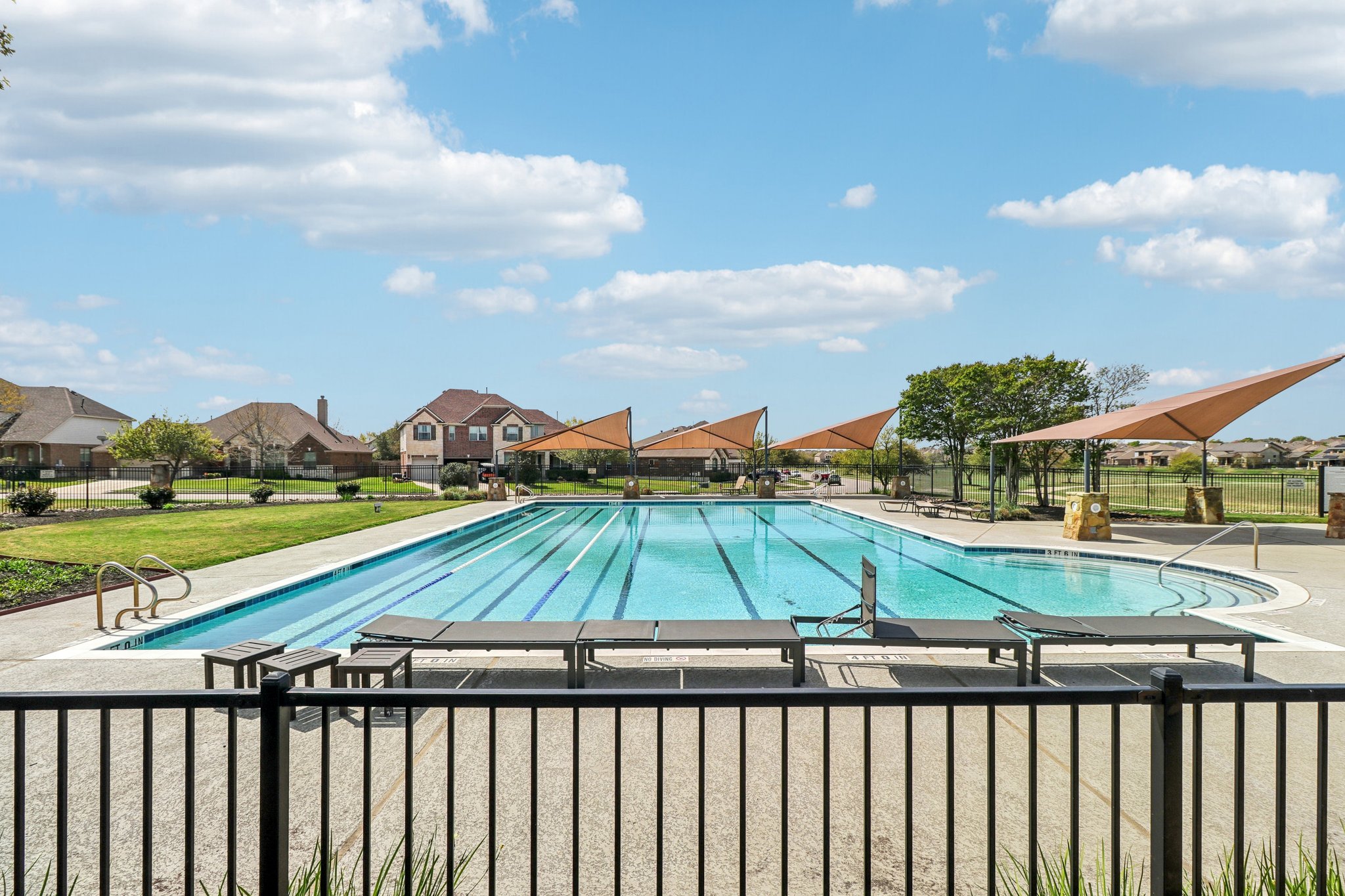 3816 Bow Perch Street Pflugerville, TX 78660 - Photo 19 of 23 a view of a yard with an umbrella
