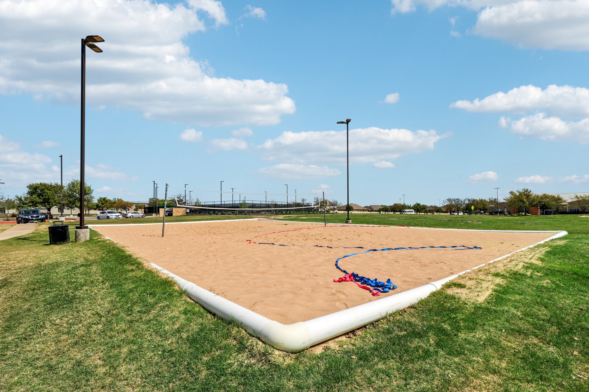 3816 Bow Perch Street Pflugerville, TX 78660 - Photo 22 of 23 a view of a swimming pool with a lounge chairs
