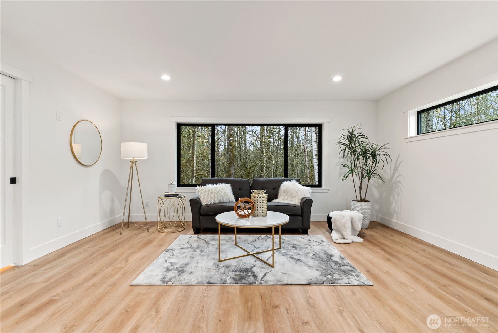15809 239th Street East Graham, WA 98338 - Photo 21 of 40 a living room with furniture and a large window