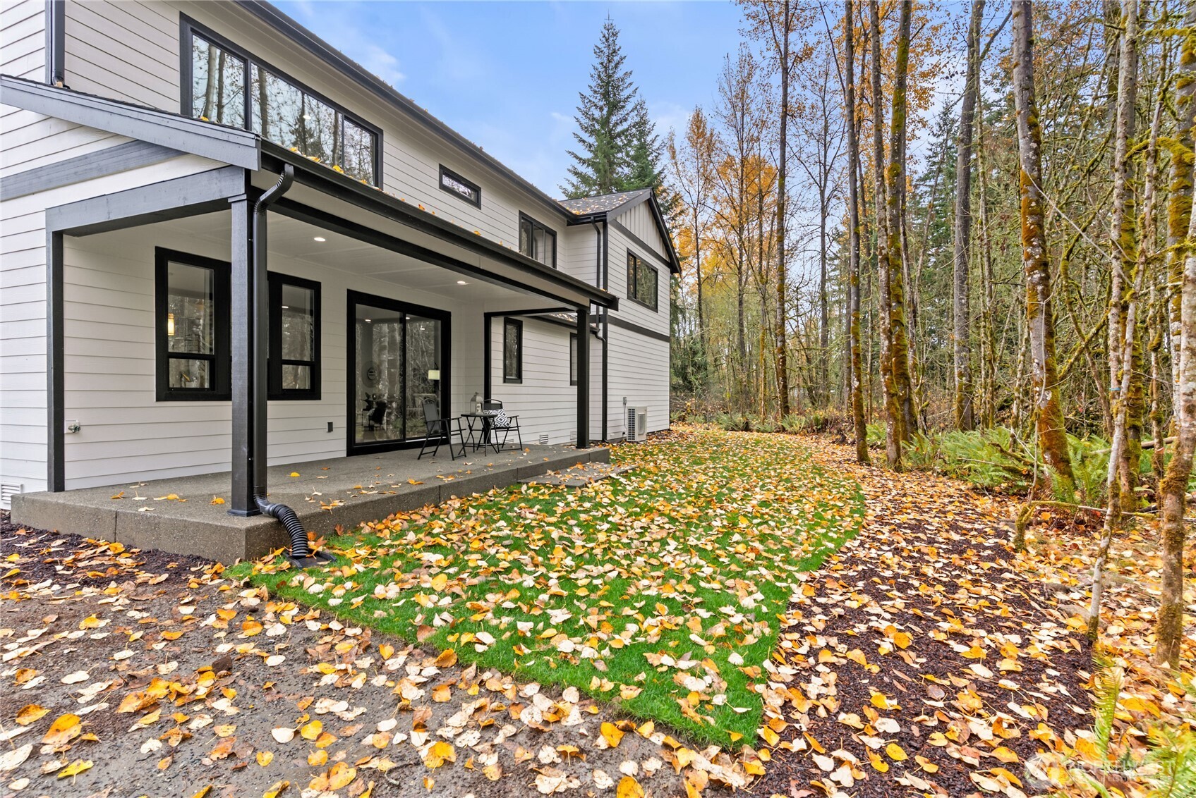 15809 239th Street East Graham, WA 98338 - Photo 38 of 40 a view of a house with a large tree