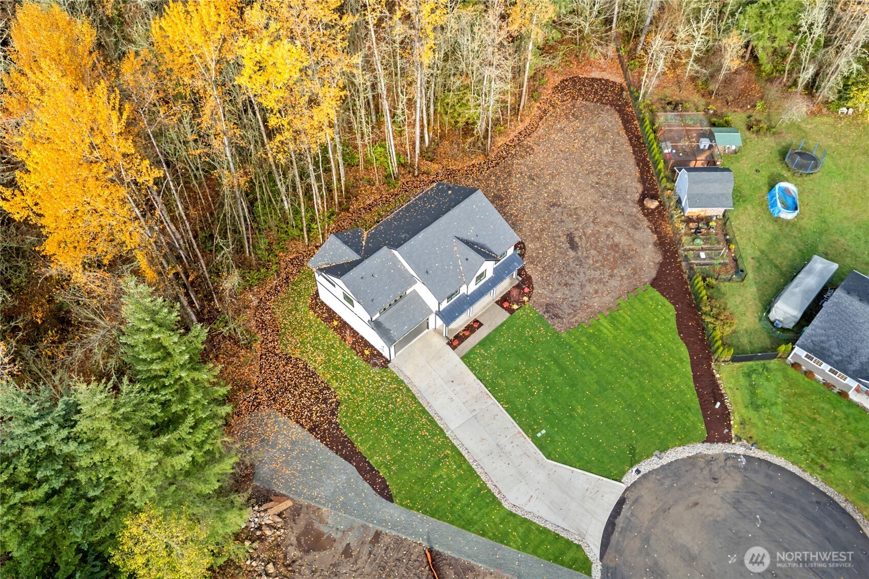 15809 239th Street East Graham, WA 98338 - Photo 40 of 40 an aerial view of a house with a yard and trees