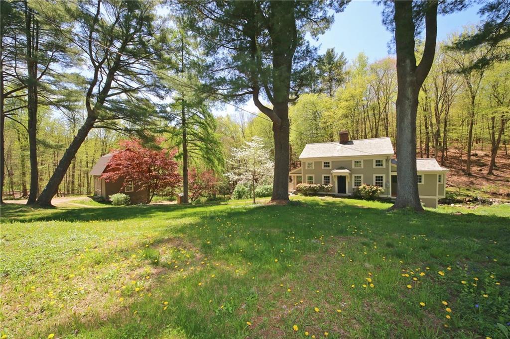 175 Florida Road Ridgefield, CT 06877 - Photo 1 of 1 a view of a house with backyard and sitting area