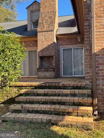 a view of house with a front door