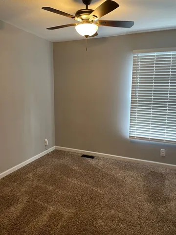 a view of backyard with hardwood and deck