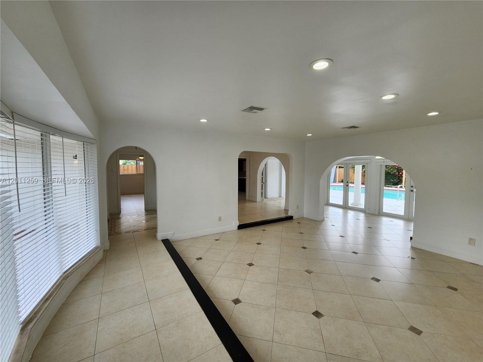 4233 Jackson Street Hollywood, FL 33021 - Photo 14 of 28 a view of empty room with a window