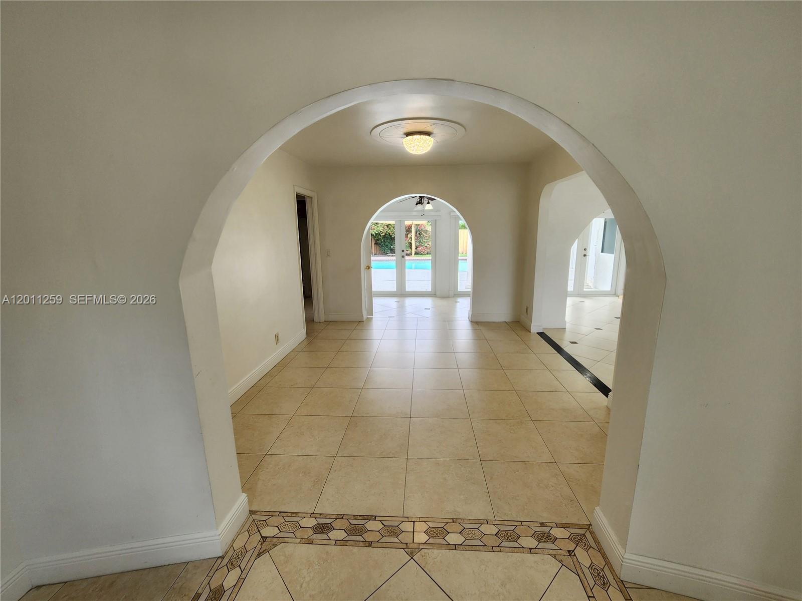 4233 Jackson Street Hollywood, FL 33021 - Photo 15 of 28 a view of entryway with wooden floor