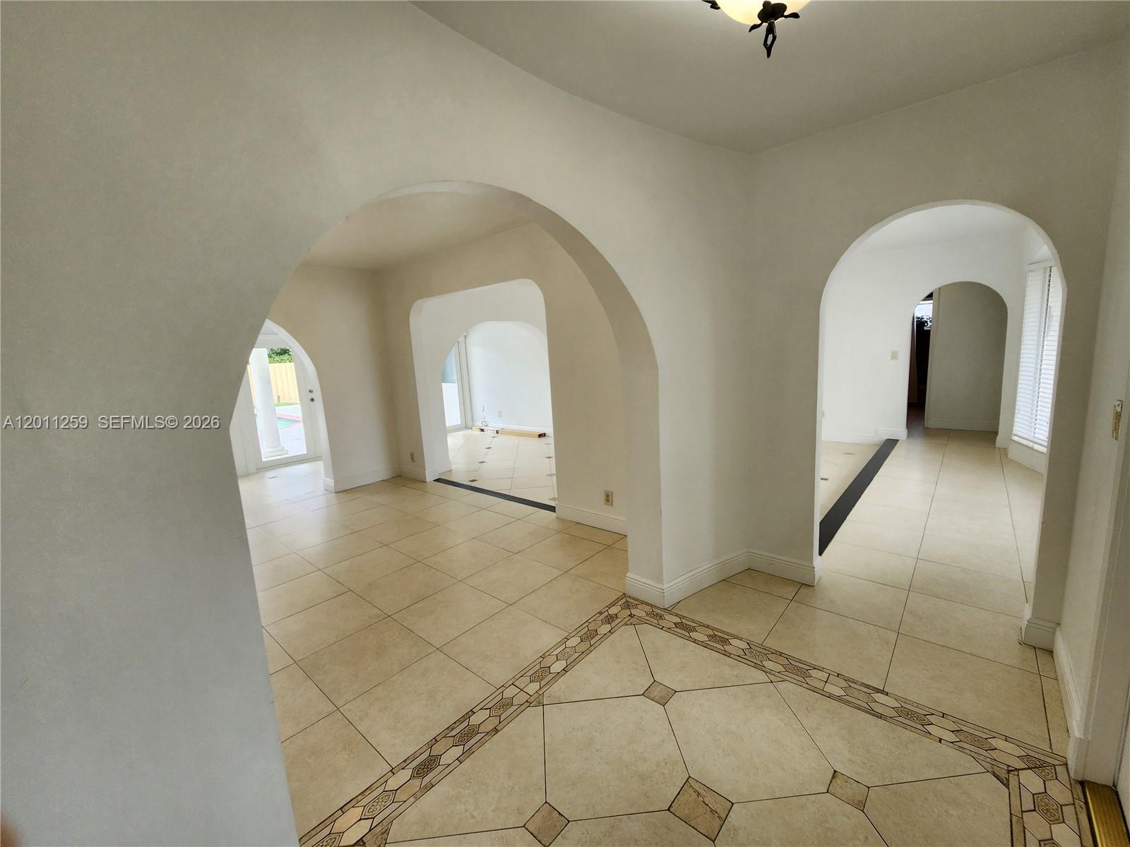 4233 Jackson Street Hollywood, FL 33021 - Photo 16 of 28 a view of entryway with a mirror