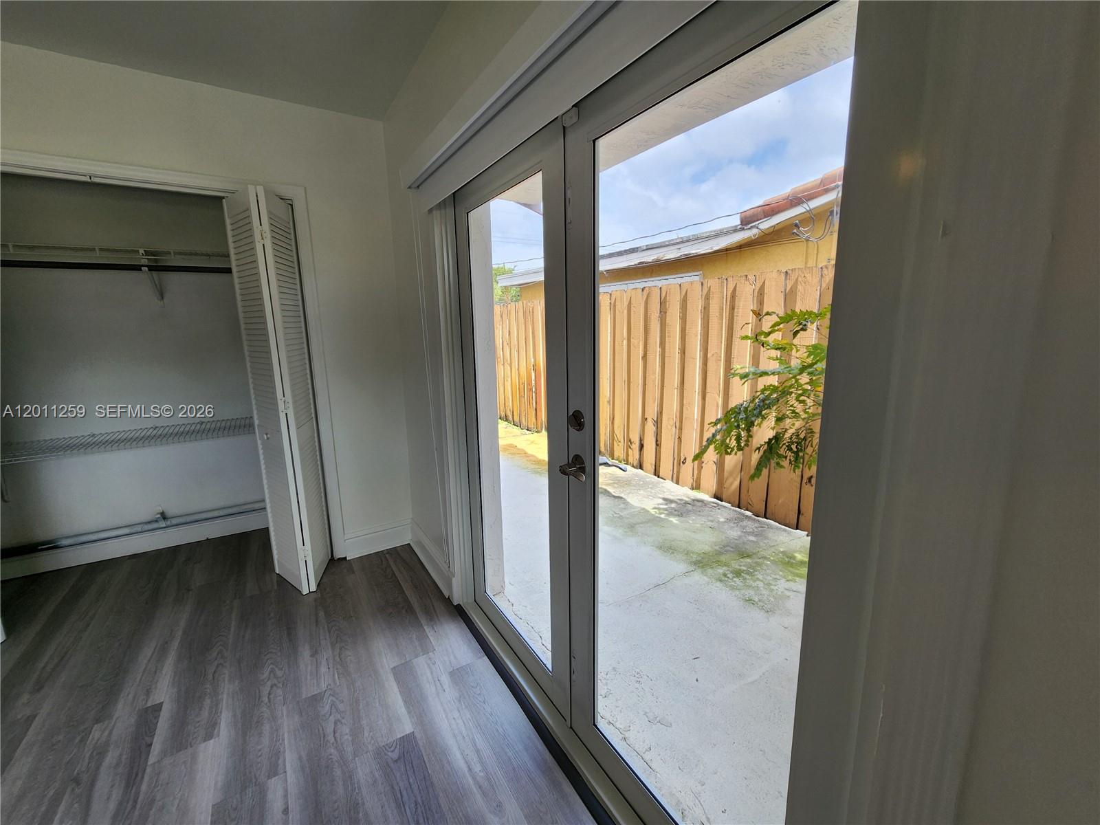4233 Jackson Street Hollywood, FL 33021 - Photo 20 of 28 a view of front door with wooden floor