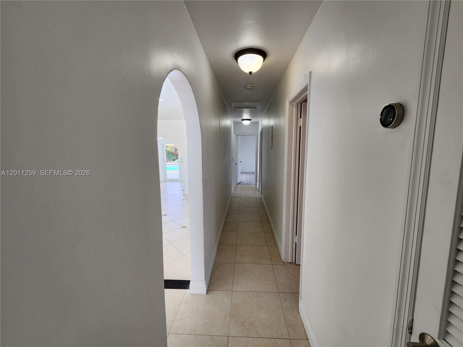 4233 Jackson Street Hollywood, FL 33021 - Photo 21 of 28 a view of a hallway with entryway door