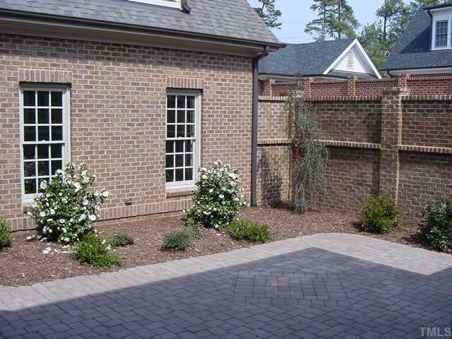 430 Lakestone Drive Raleigh, NC 27609 - Photo 12 of 12 a front view of a house with garden