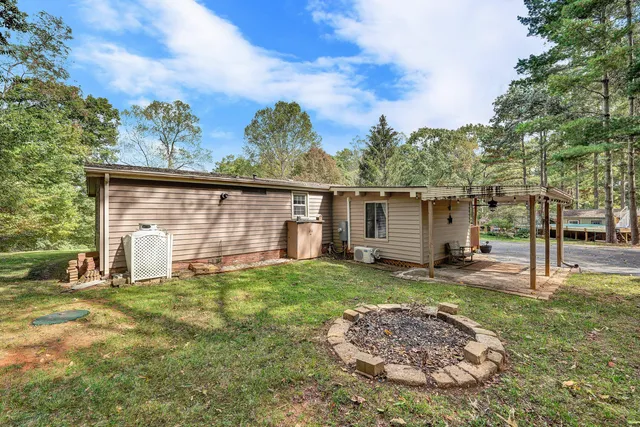 a view of a park with large trees