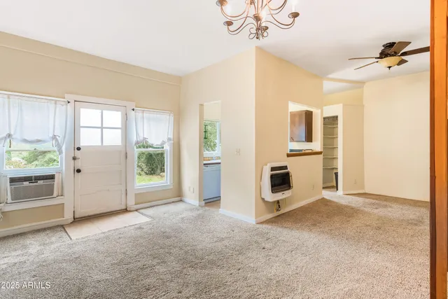 an empty room with a bathroom