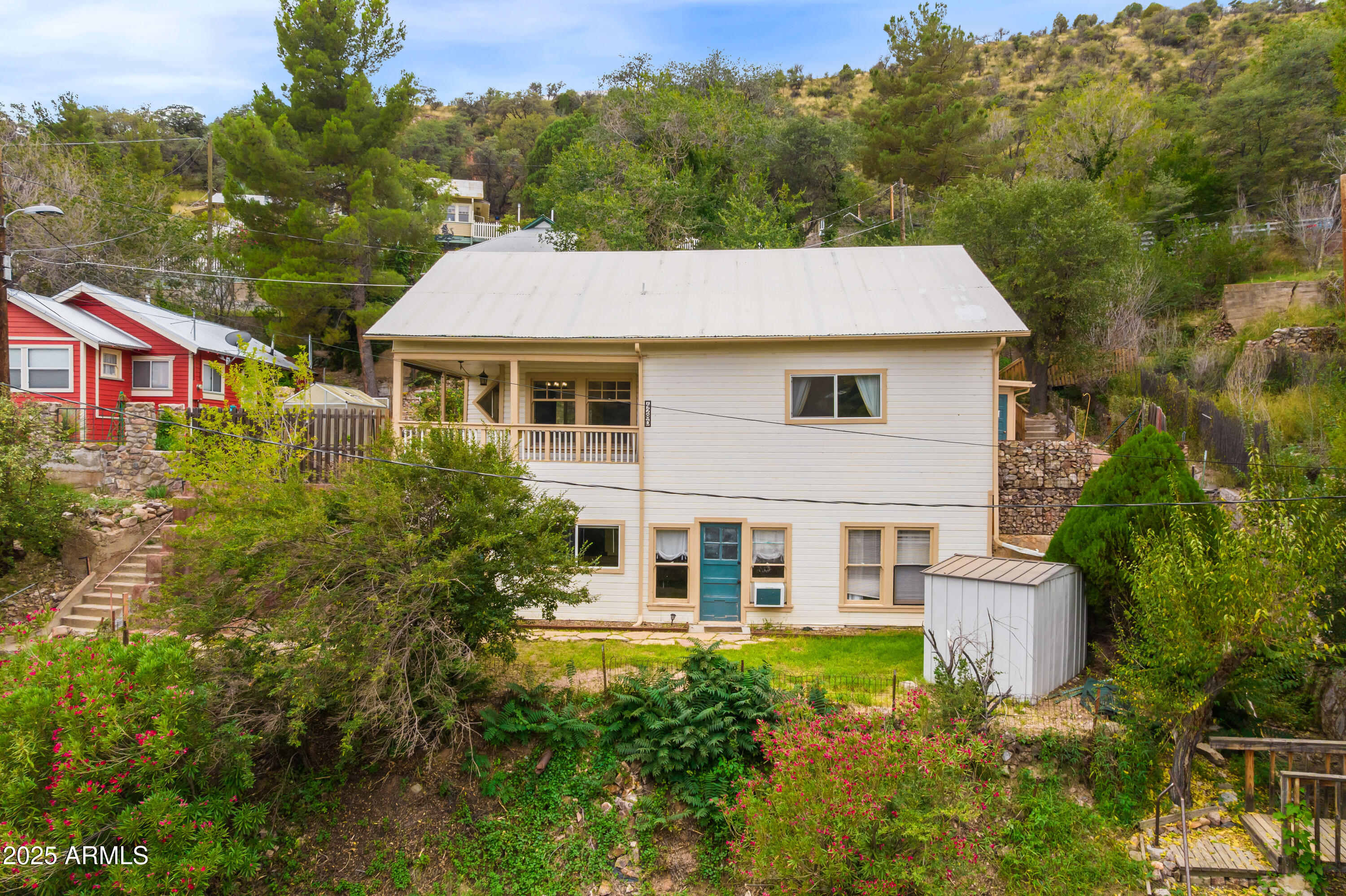 428 Brophy Avenue, Unit D Bisbee, AZ 85603 - Photo 5 of 40 front view of a house with a yard