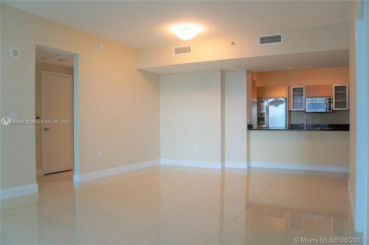 951 Brickell Avenue, Unit 2405 Miami, FL 33131 - Photo 11 of 38 a view of a room with a window