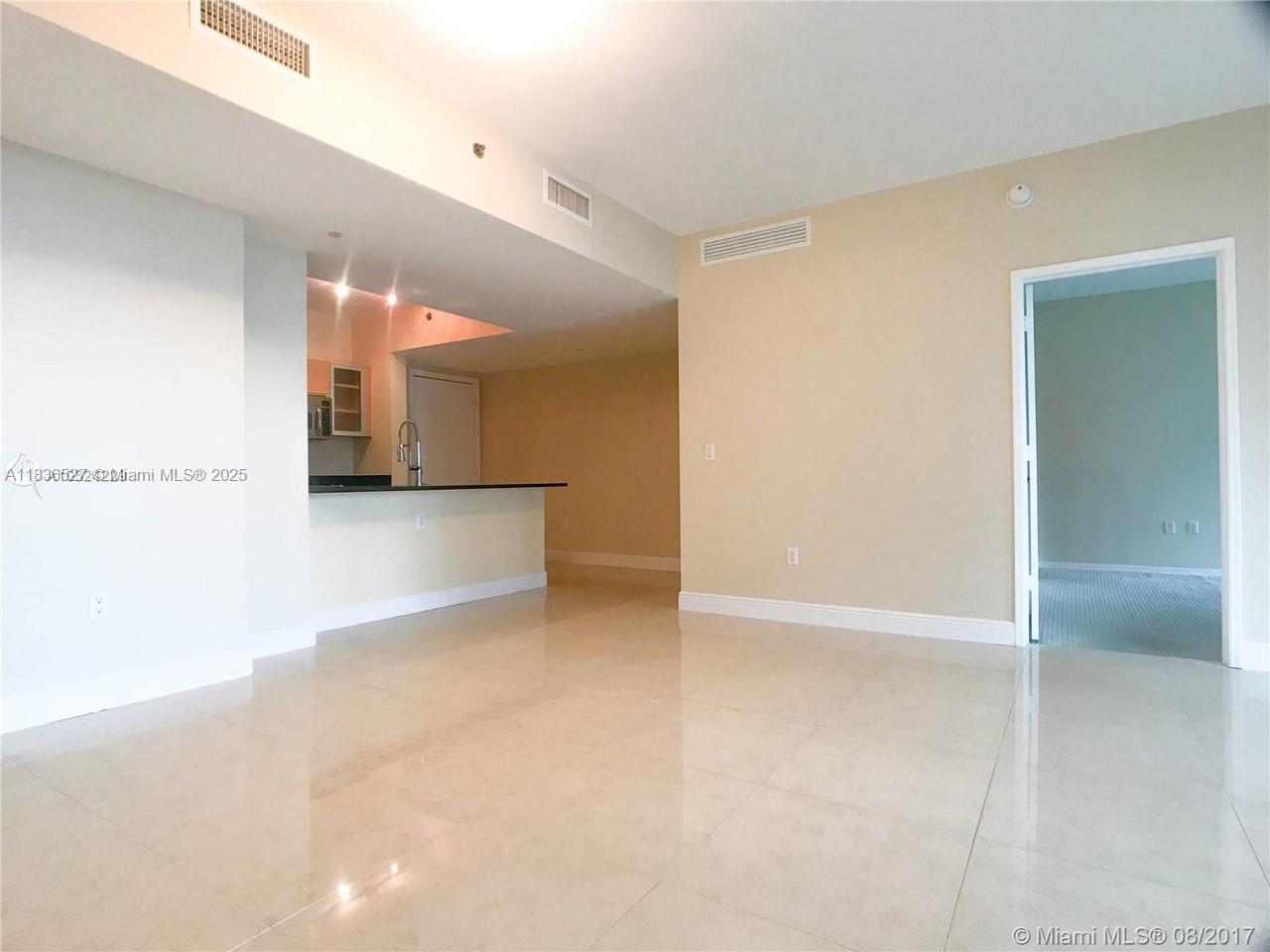 951 Brickell Avenue, Unit 2405 Miami, FL 33131 - Photo 7 of 38 a view of a hallway