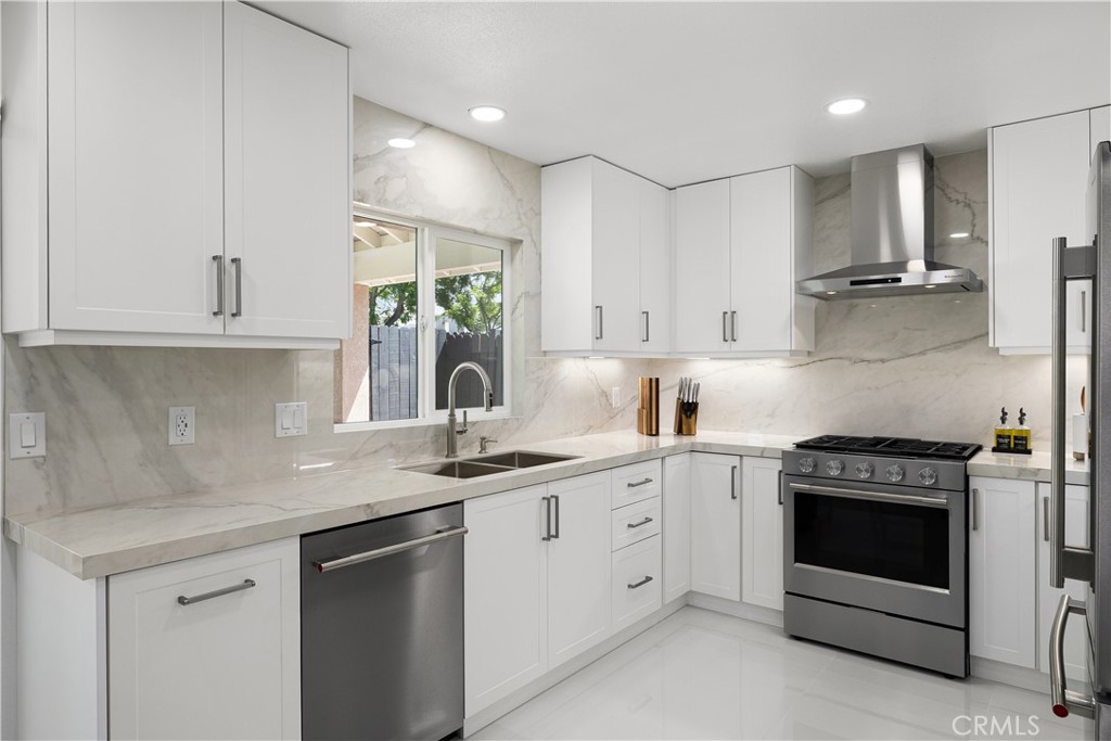 3004 Cardamon Street Rialto, CA 92376 - Photo 23 of 60 Gourmet Kitchen with KitchenAid Appliances & Full-Height Porcelain Slab Backsplash