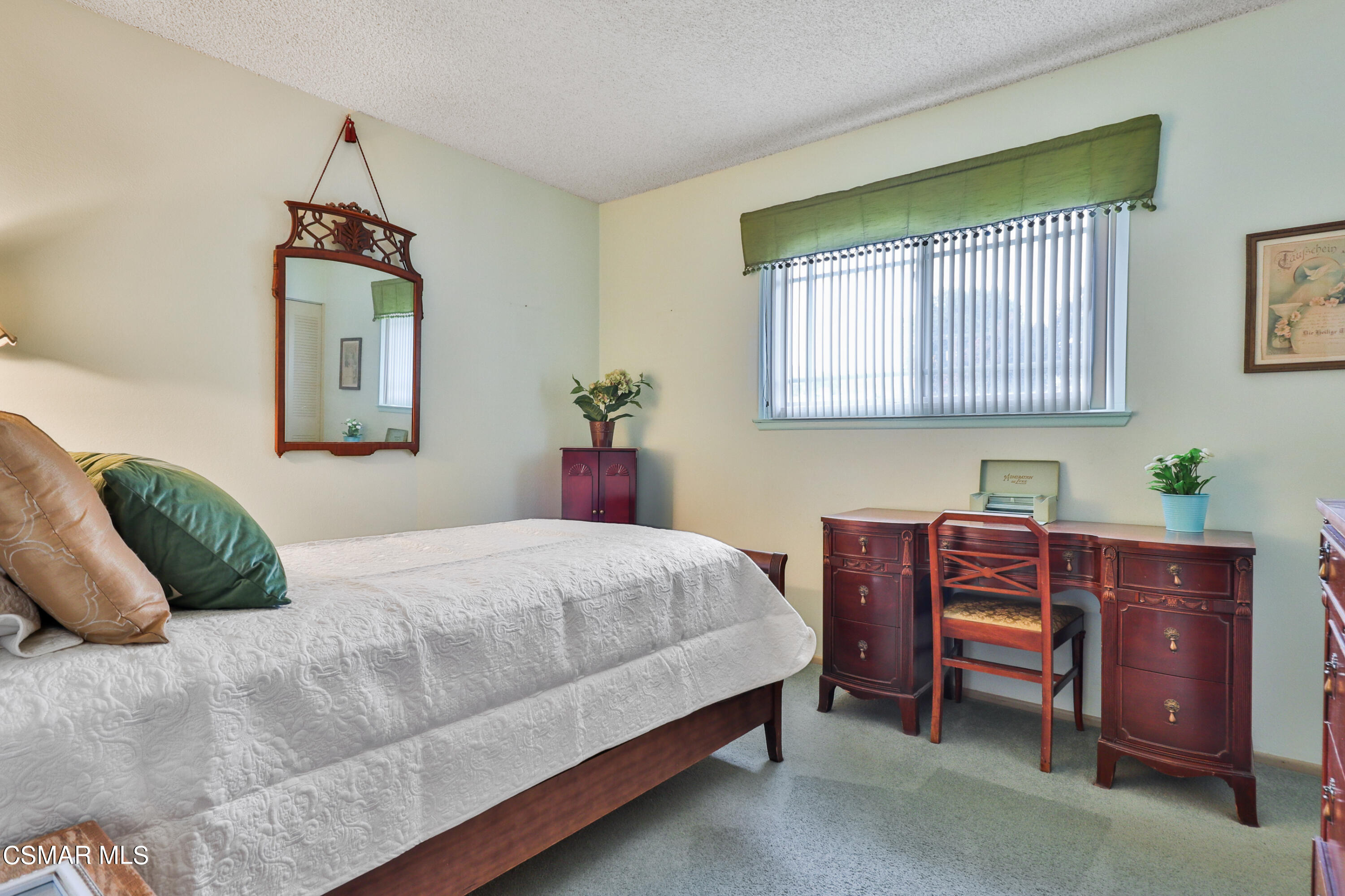 1567 Fitzgerald Road Simi Valley, CA 93065 - Photo 13 of 25 a bedroom with a bed and a dresser