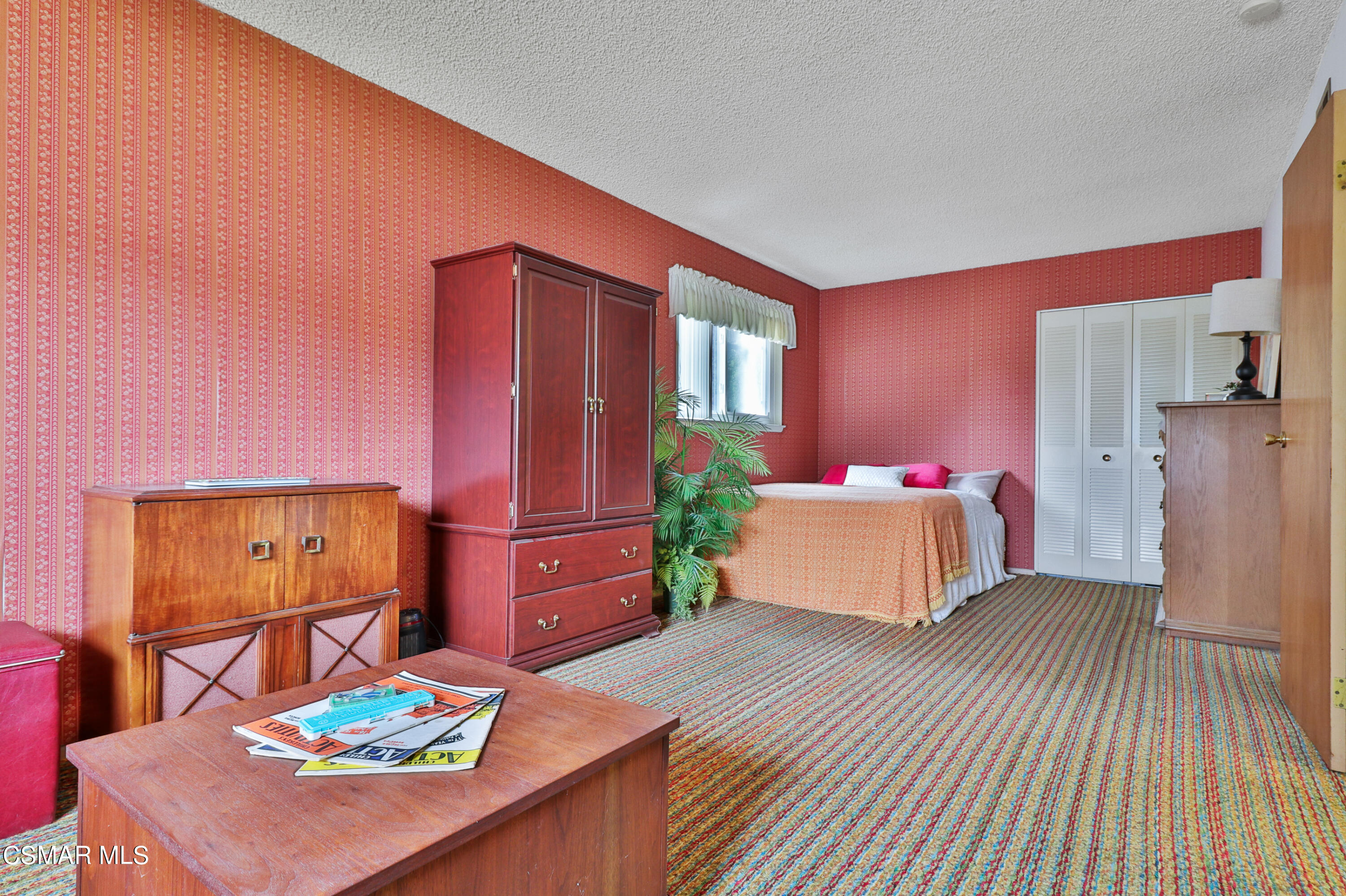 1567 Fitzgerald Road Simi Valley, CA 93065 - Photo 15 of 25 a bedroom with a bed and a dresser