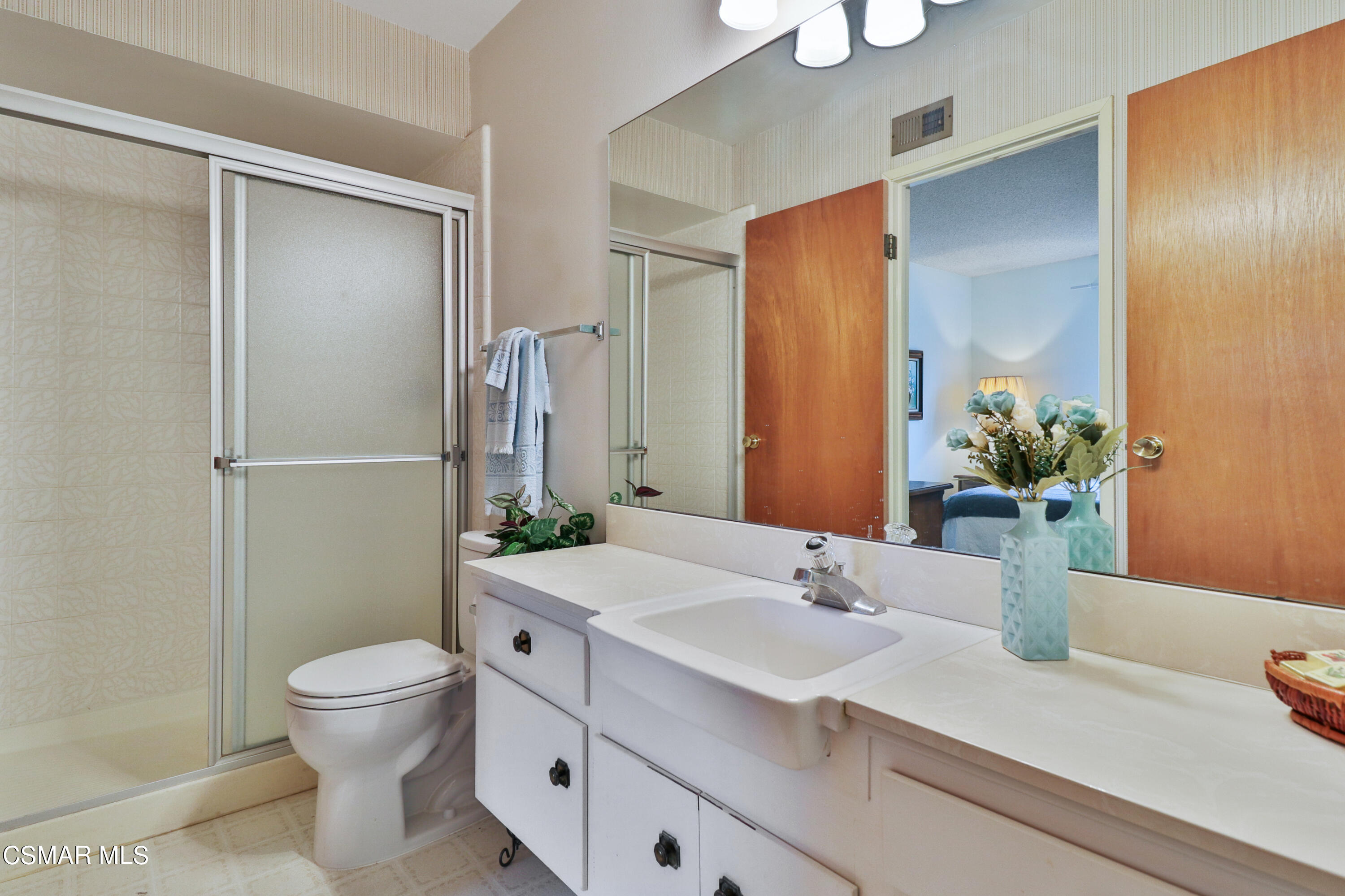 1567 Fitzgerald Road Simi Valley, CA 93065 - Photo 20 of 25 a bathroom with a sink toilet and shower