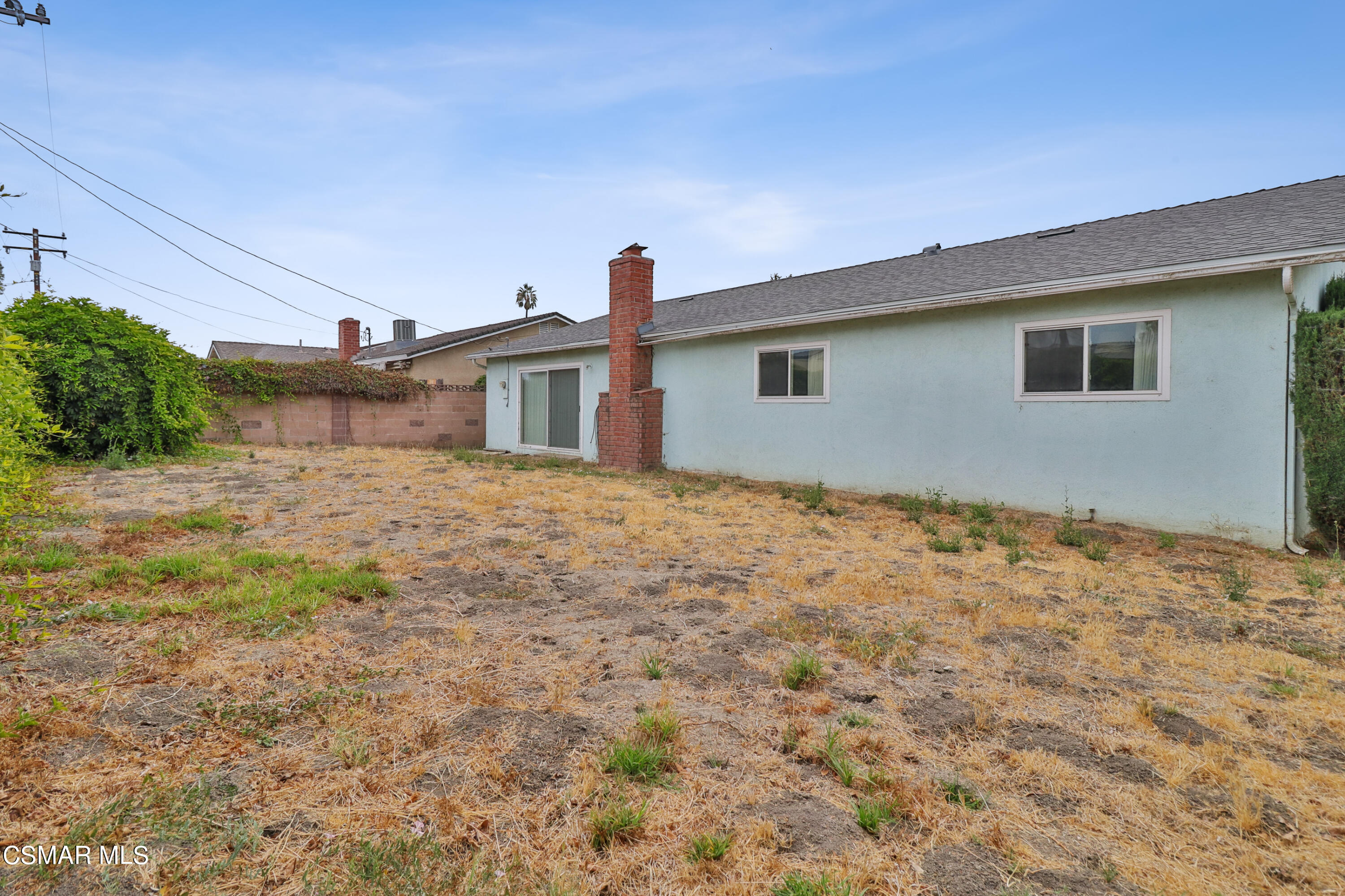 1567 Fitzgerald Road Simi Valley, CA 93065 - Photo 23 of 25 a house with a yard