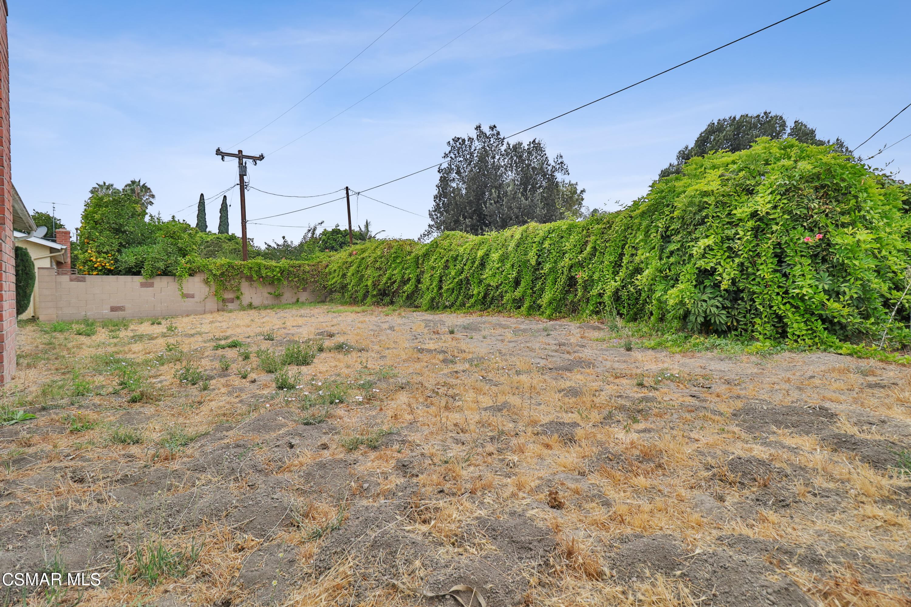 1567 Fitzgerald Road Simi Valley, CA 93065 - Photo 24 of 25 a view of a road with a building in the background