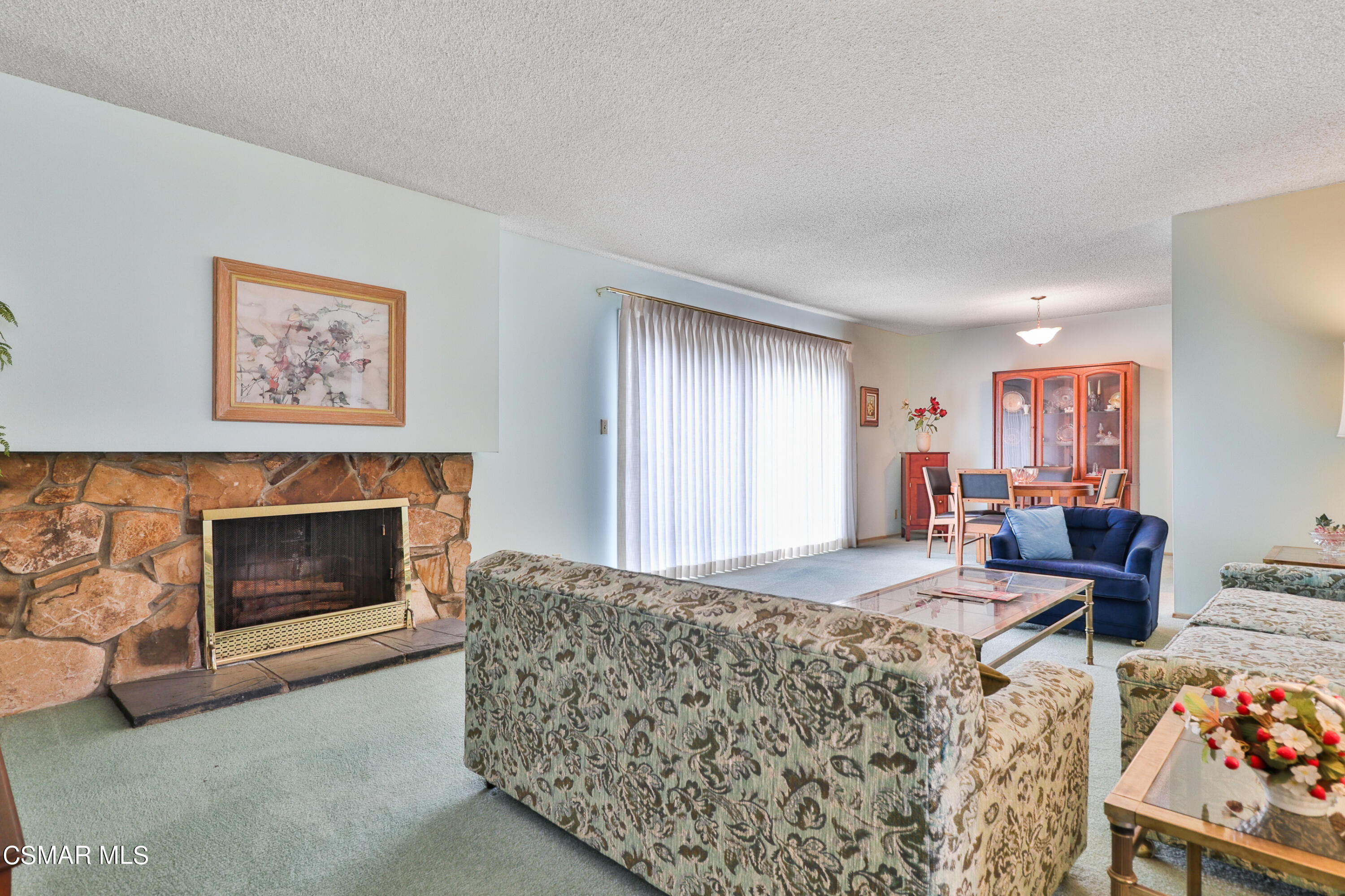 1567 Fitzgerald Road Simi Valley, CA 93065 - Photo 10 of 25 a living room with furniture and a fireplace