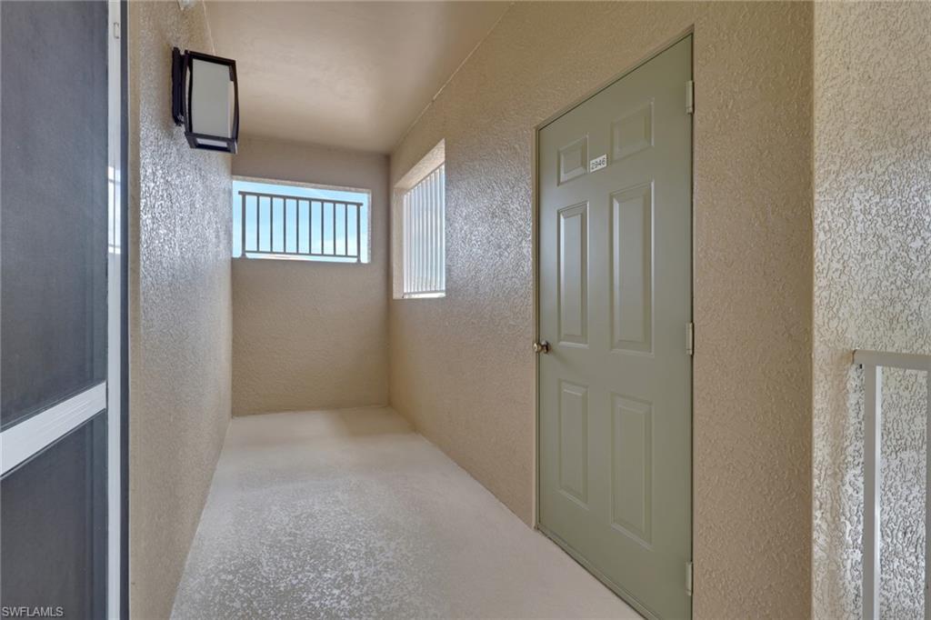 3830 Sawgrass Way, Unit 2946 Naples, FL 34112 - Photo 3 of 38 End unit, large storage unit