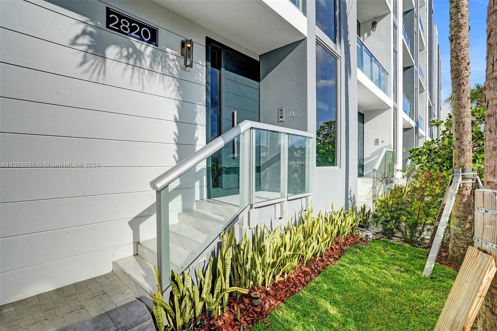 2870 North Ocean Drive Hollywood, FL 33019 - Photo 2 of 57 a view of building with flower plants