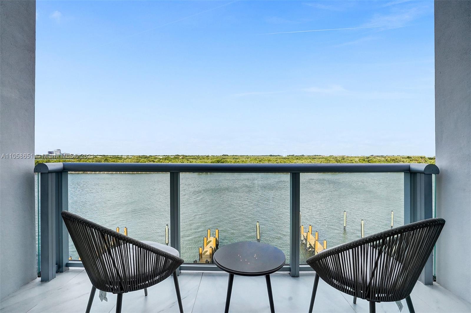 2870 North Ocean Drive Hollywood, FL 33019 - Photo 22 of 57 a balcony with table and chairs