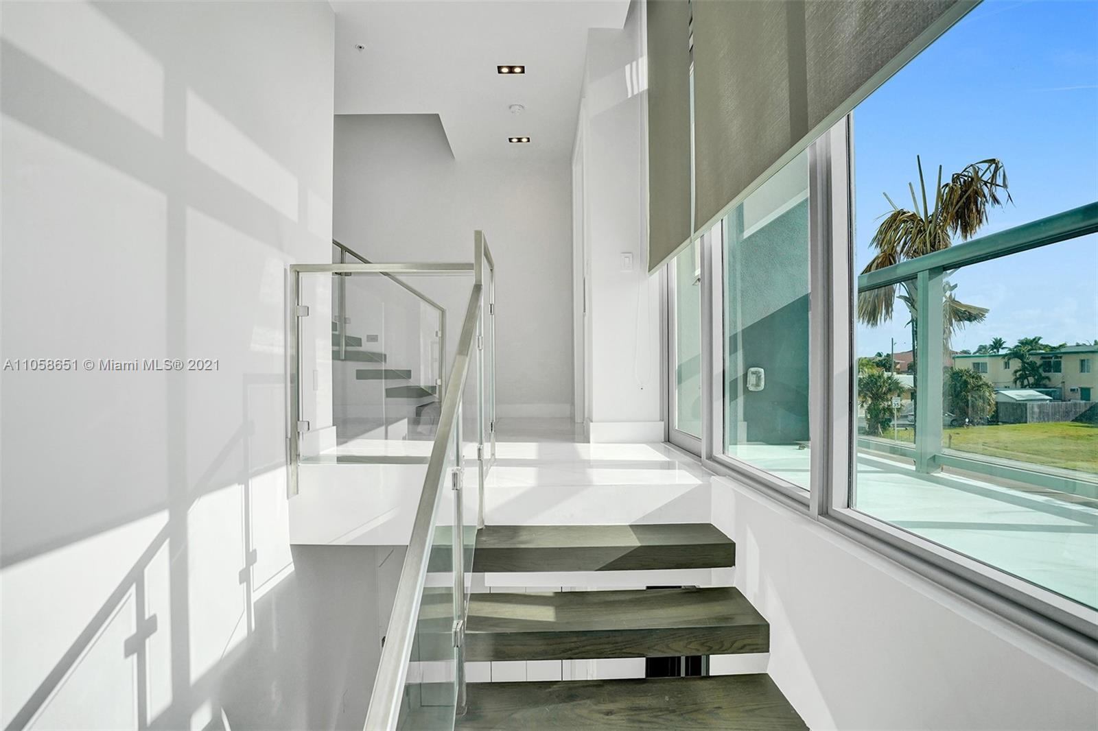 2870 North Ocean Drive Hollywood, FL 33019 - Photo 44 of 57 a view of entryway and hall with wooden floor