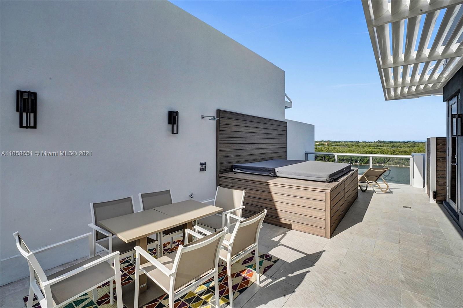 2870 North Ocean Drive Hollywood, FL 33019 - Photo 49 of 57 a view of a chairs and table in patio