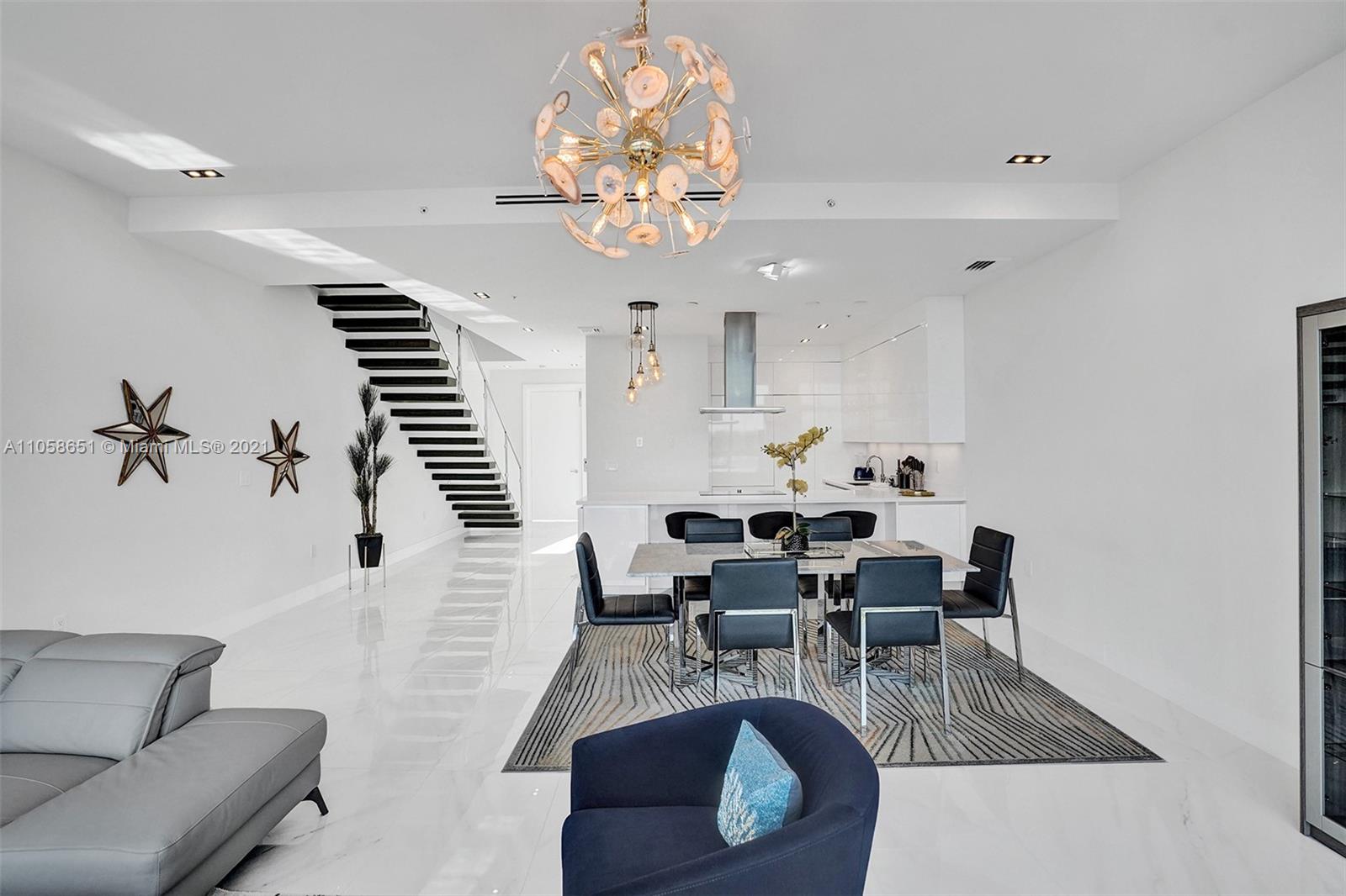 2870 North Ocean Drive Hollywood, FL 33019 - Photo 6 of 57 a view of a dining room with furniture