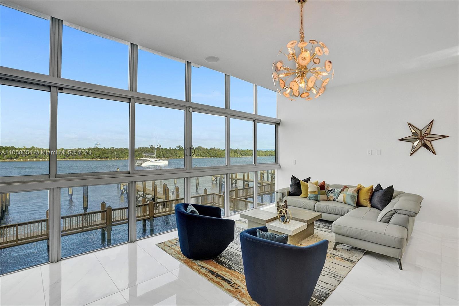 2870 North Ocean Drive Hollywood, FL 33019 - Photo 8 of 57 a living room with patio furniture and a potted plant