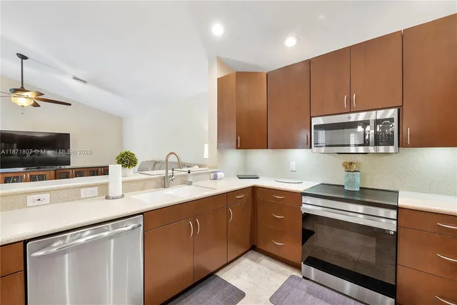 a bedroom with a bed and a chair