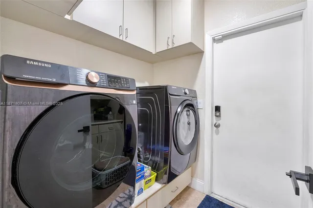 a view of a garden with a house in the background