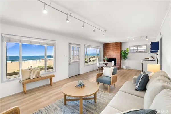 a kitchen with stainless steel appliances granite countertop a potted plant a sink and a potted plant