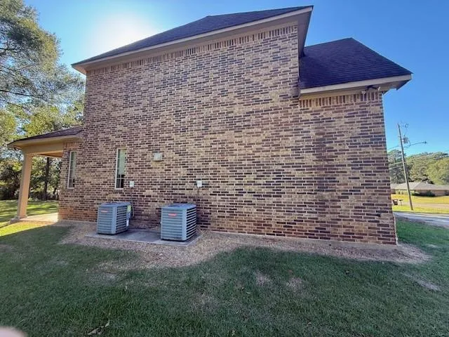 a front view of a house with patio
