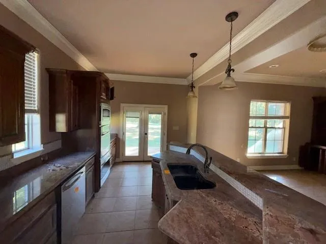 a large living room with a large window