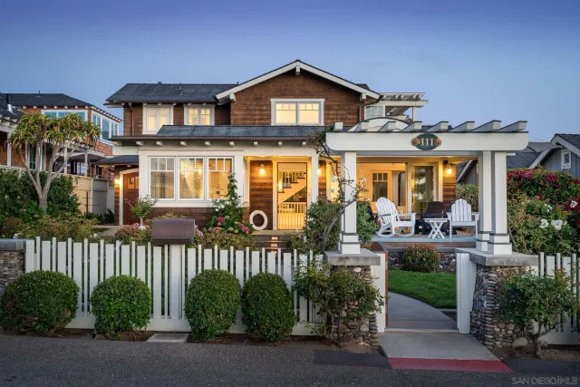 a front view of a house with a porch