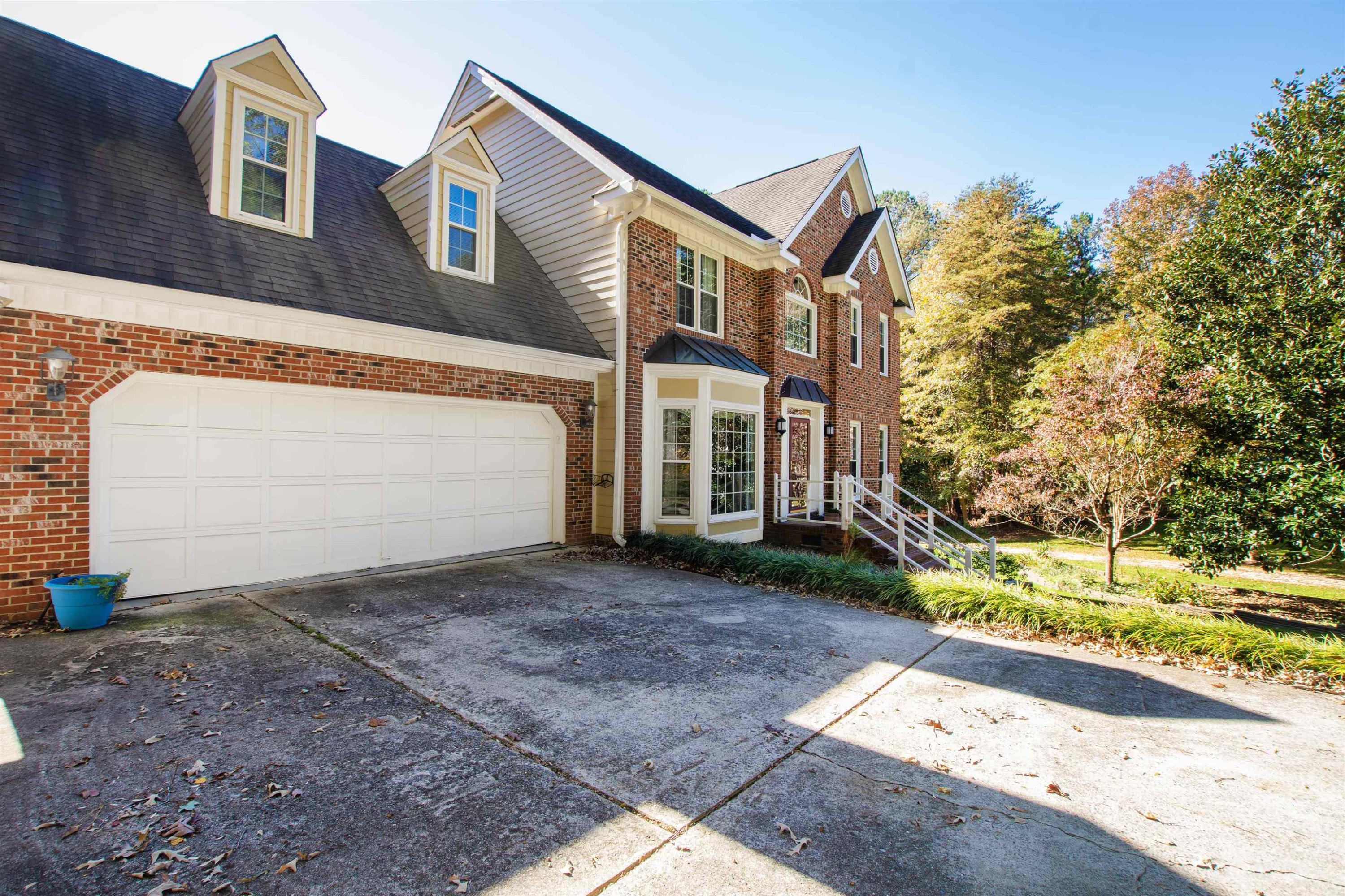 6404 Olivula Terrace Raleigh, NC 27613 - Photo 3 of 49 a view of a house with a yard