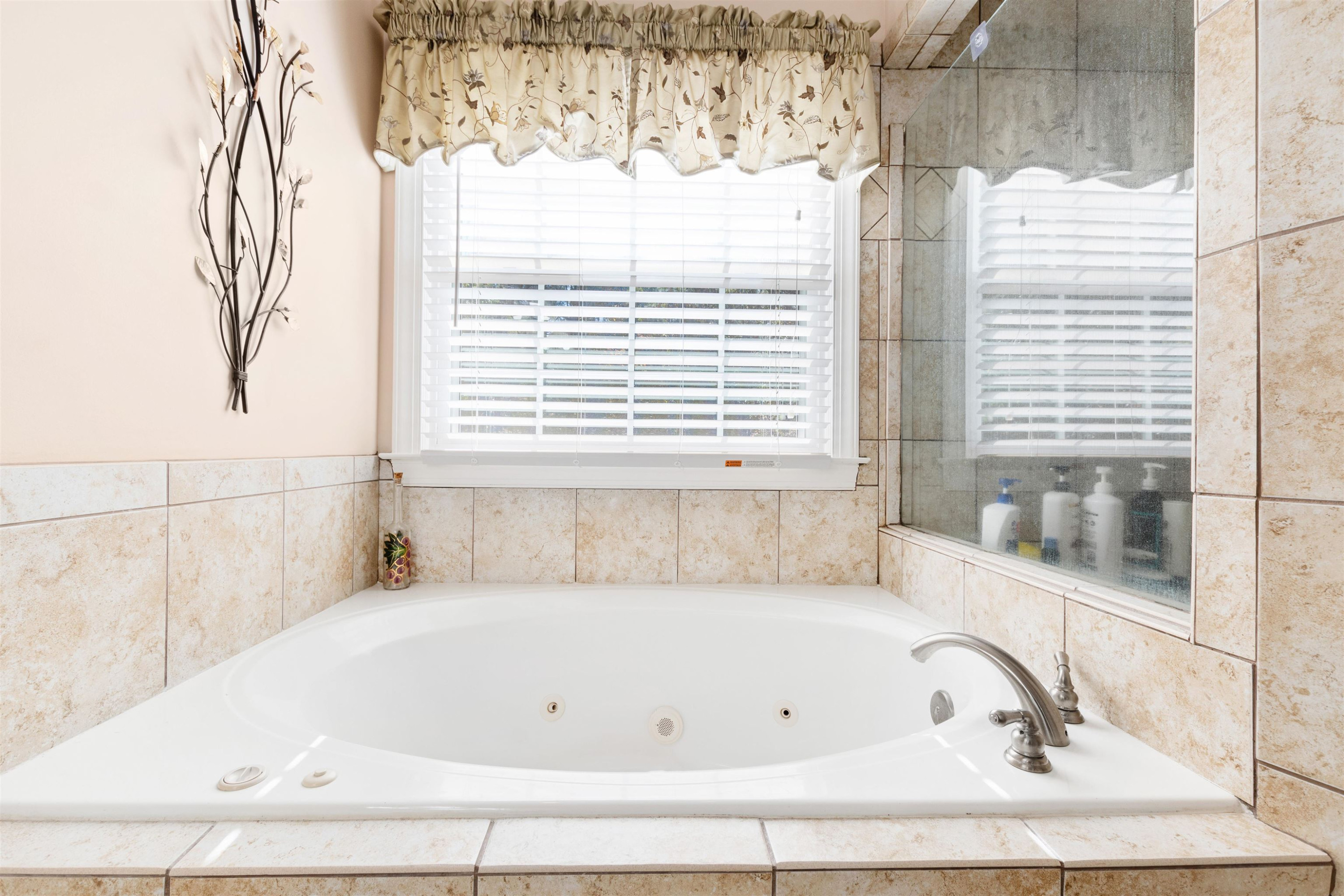 6404 Olivula Terrace Raleigh, NC 27613 - Photo 33 of 49 a white bath tub sitting next to a window