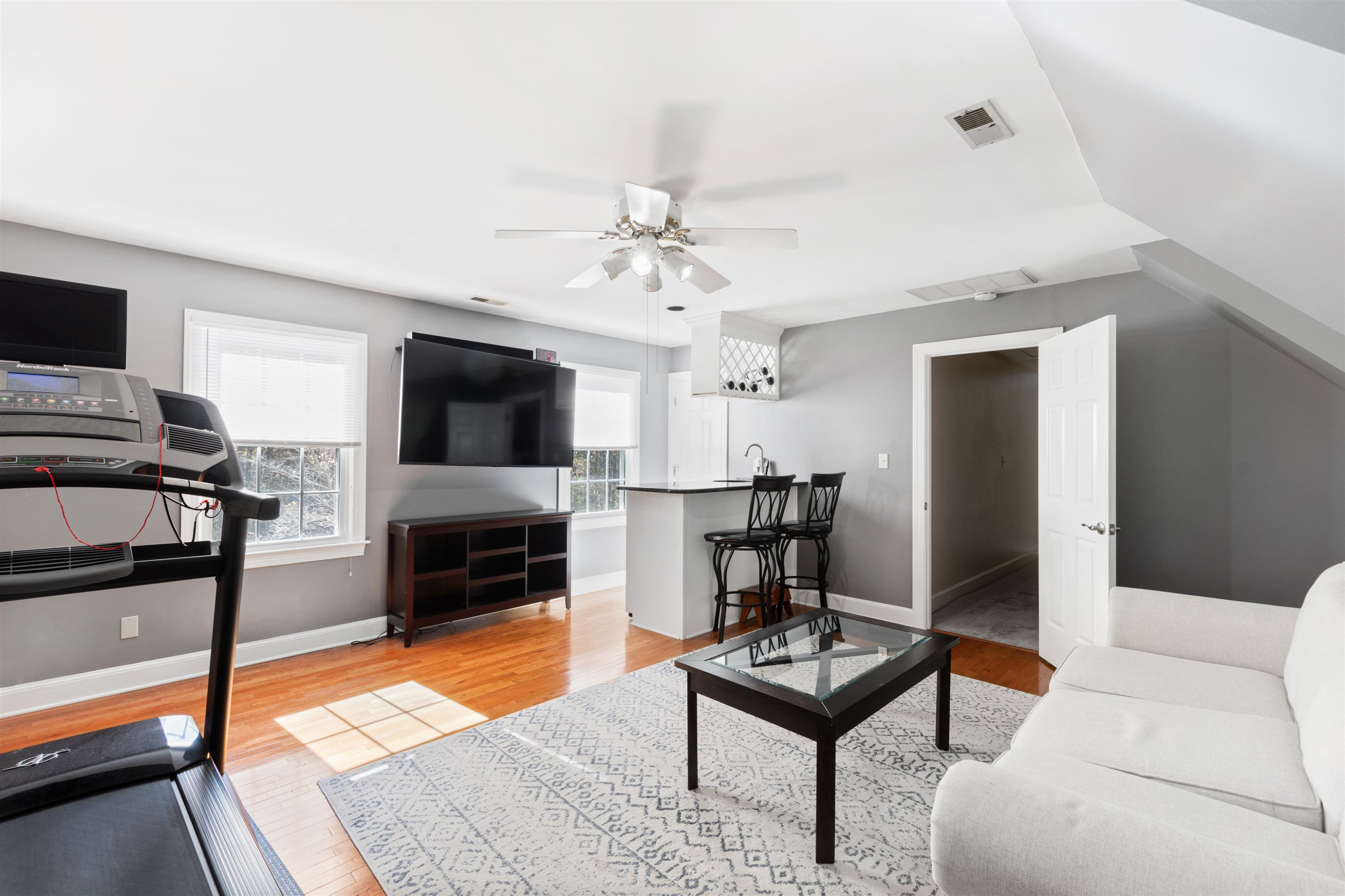 6404 Olivula Terrace Raleigh, NC 27613 - Photo 36 of 49 a living room with furniture and a flat screen tv