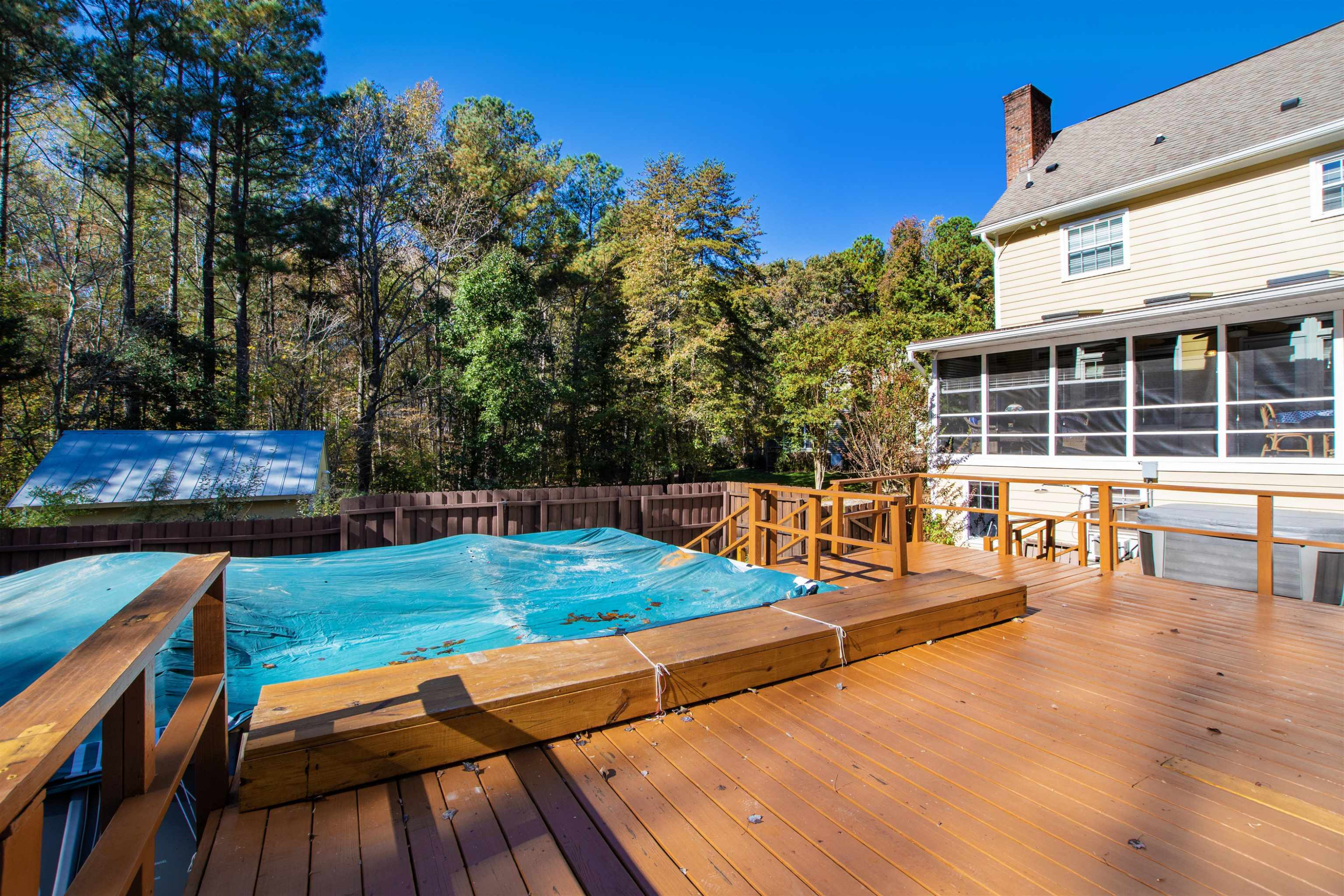 6404 Olivula Terrace Raleigh, NC 27613 - Photo 42 of 49 a view of a backyard with chairs