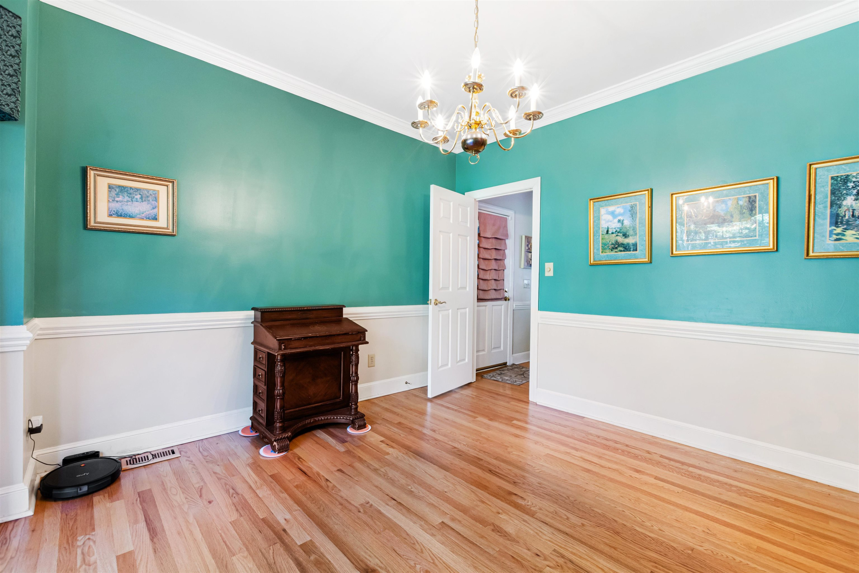 6404 Olivula Terrace Raleigh, NC 27613 - Photo 7 of 49 a view of a room with wooden floor fireplace and windows
