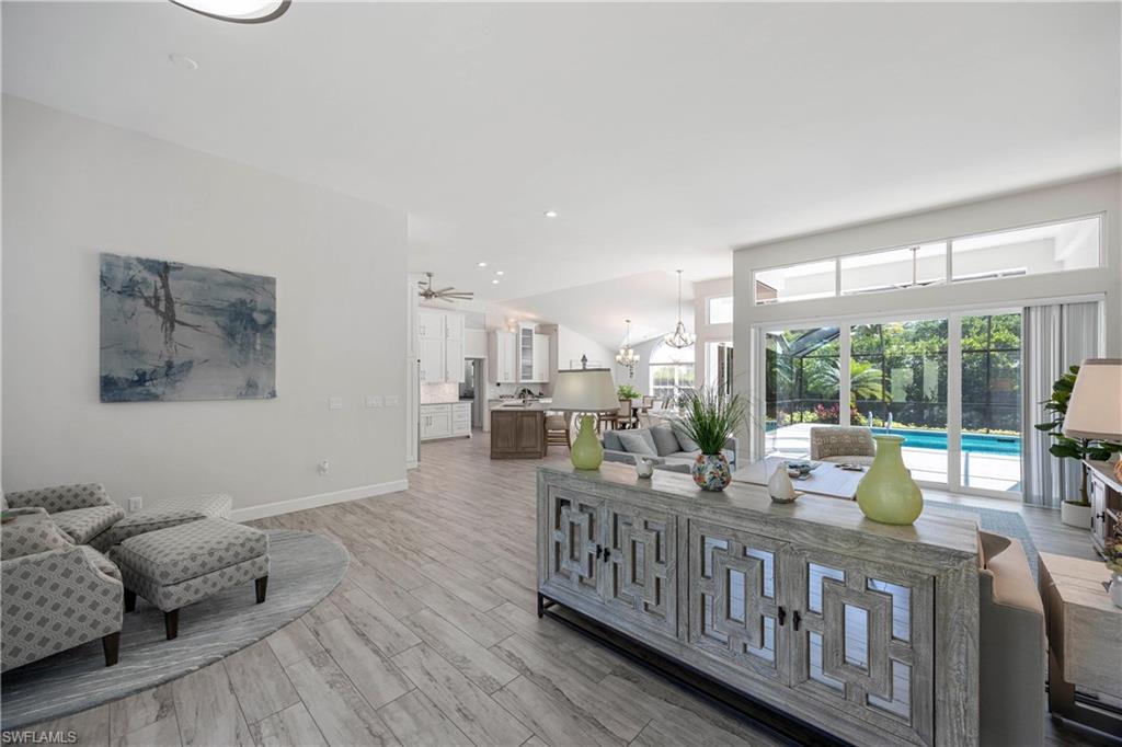 1850 Crayton Road Naples, FL 34102 - Photo 14 of 48 a view of a dining room with furniture window and outside view